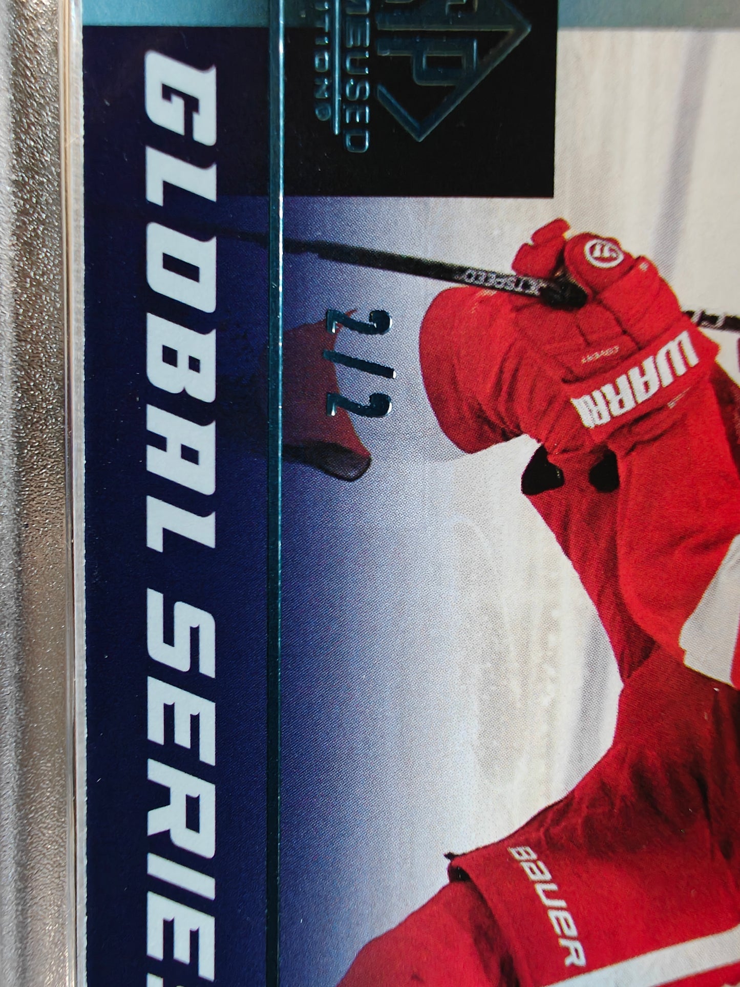 2024-25 SP Game Used Dylan Larkin #GSF-DL Global Series Fabrics Shield Patch /2